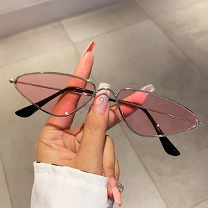 Retro narrow cat eye sunglasses with silver metal frame and pink lenses for fashion street style