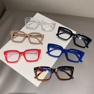 Top view of thick square frame glasses in various colors like tortoiseshell and clear