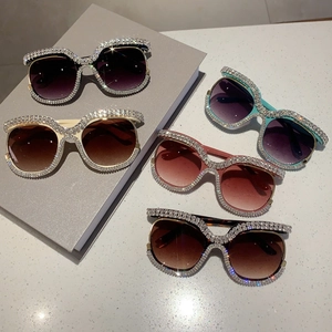 Oversized square sunglasses with rhinestones in black, cream, mint, pink, and tortoise colors