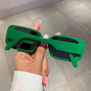 Fashionable green rectangular sunglasses with thick frames and dark gray UV lenses