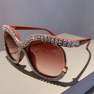 Luxury oversized rhinestone sunglasses with gradient lenses and sparkling crystal frames
