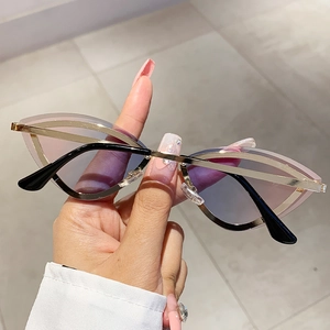 Fashionable rimless cat-eye sunglasses with colorful gradient lenses and gold frames