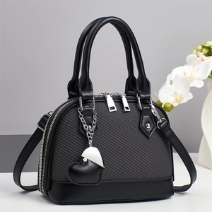 Sac Dôme Femmes Cuir PU Texture Tissée Fermeture Éclair Sac À Main Bandoulière Avec Pendentif Coeur