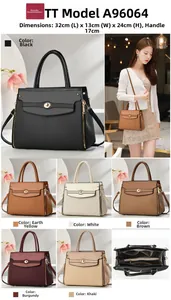 Detailed view of luxury leather handbag with dimensions 32x13x24cm and color options