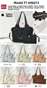 Detail view of stylish tote bag set with textured fabric and dimensions on display