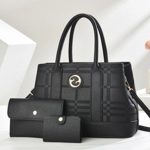 Three-piece black lychee pattern handbag set with quilted texture and gold hardware details