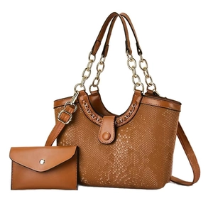 Brown snake pattern handbag with gold chain handle and matching clutch purse