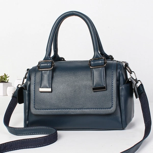 Dark blue leather texture Boston bag with dual handles and woven shoulder strap