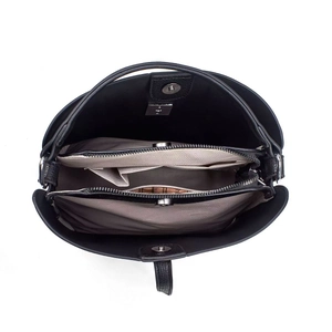 Internal view of black leather bucket bag showing triple main compartments and metal logo