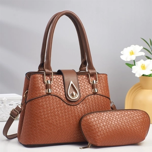 Two-piece set lizard-texture brown tote and matching pouch with metallic hardware accents