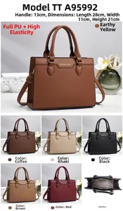 Detailed view of large PU leather handbag with dimensions 28x11x21cm and internal zipper pocket