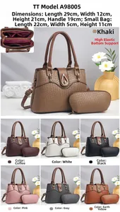 Detailed view of woven lizard-textured tote bag set with metal drop lock and dimensions