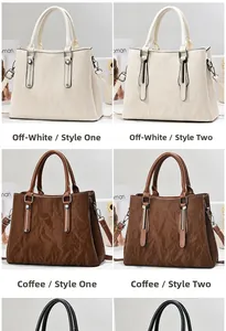 Detail of faux leather tote bags with pleated textures and metallic buckle accents