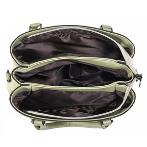 Interior view of soft green leather handbag with three large compartments and zip pocket