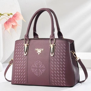 Fashionable purple lychee texture handbag with golden logo and embroidery detail