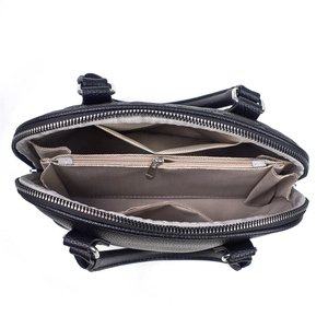 Interior view of black pebbled leather crossbody bag with multiple storage compartments