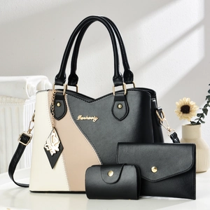 Elegante juego de bolsos de tres piezas en contraste de colores con detalles dorados
