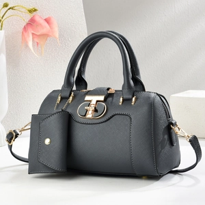 Large black textured tote bag with gold hardware and small coin purse attachment