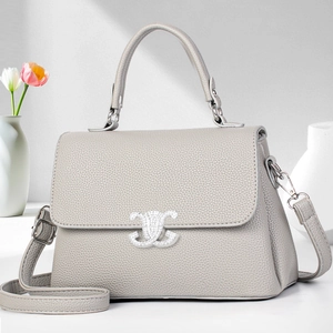 Gray lychee grain leather crossbody handbag with silver diamond-studded buckle and top handle