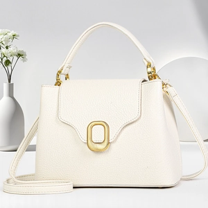 White lychee leather small square handbag with gold oval buckle and top handle