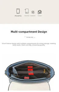 Detail view of the light blue handbag interior featuring multi-compartment storage space