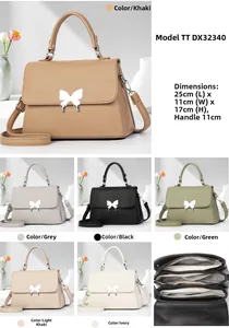 Detail showing various colors and multi-compartment interior of large soft leather tote