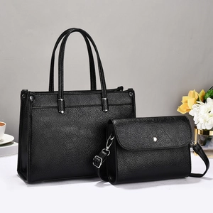 Detailed view of black litchi pattern tote and crossbody bag set for daily use