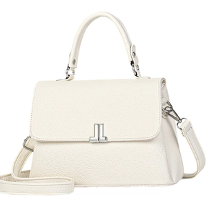 Elegant cream white pebbled leather tote bag with silver magnetic clasp and shoulder strap