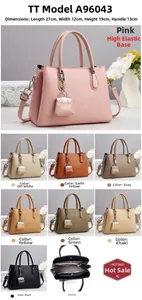 Vue détaillée du sac à bandoulière avec plusieurs couleurs et rangement intérieur
