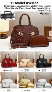 Detail of crocodile pattern faux leather handbag set with metal buckle and size info