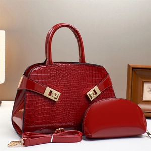 Elegant red crocodile pattern handbag set with golden hardware and detachable strap