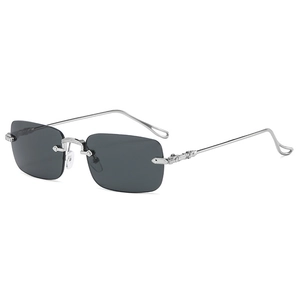 Lunettes de soleil carrées sans monture avec branches en métal argenté ciselé