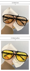 Detail view of oval pilot sunglasses in C2 black-tan and C3 black-yellow color variants