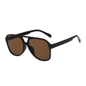 Classic black aviator sunglasses with brown lenses and a stylish double bridge design