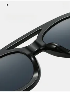 Close-up of comfortable integrated nose pads on black vintage oval sunglasses