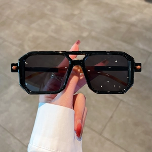 Chic black geometric square sunglasses with double bridge and orange bead detail