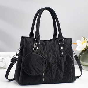Black pleated tote bag with round coin purse and silver studs for women's daily commute