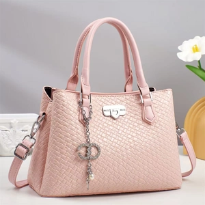 Pink woven texture handbag for women featuring a heart metal buckle and crossbody strap
