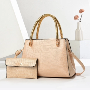 Elegant beige crocodile pattern handbag set with golden handles and a small envelope clutch