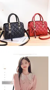 Close-up of quilted crossbody bag with butterfly chain and versatile carry options