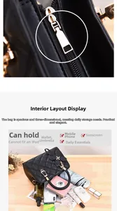 Detail view of black quilted leather handbag interior with multi-compartment storage