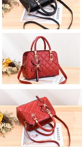Detail view of quilted leather handbags with golden hardware and butterfly charm accents