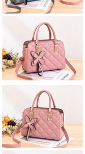 Detail of pink quilted handbag featuring gold butterfly charm and adjustable shoulder strap