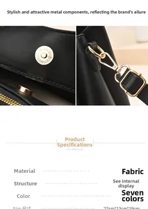 Detail of golden magnetic buckle and hardware on black large capacity crossbody handbag