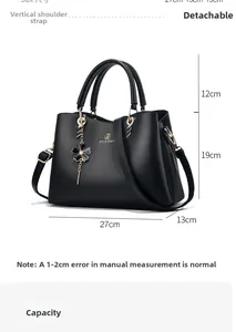 Detailed size chart for black leather handbag showing dimensions 27x13x19cm and straps