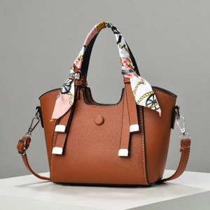 Brown lychee leather handbag for women with decorative scarf handle and shoulder strap