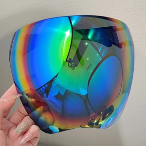Macro detail of the full face safety shield with a colorful iridescent mirror coating