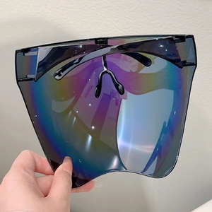Macro shot of colorful iridescent protective face shield with stylish black frame