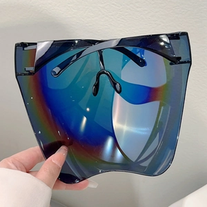 Macro shot of colorful gradient iridescent lens on a full face protective mask shield