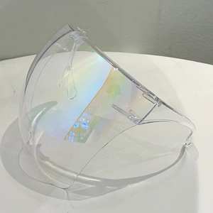 Detail of colorful iridescent coating on clear face shield with protective PC material
